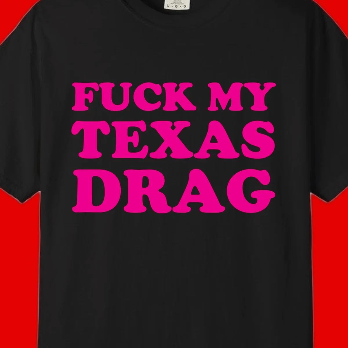 Bold magenta text reading 'Fuck My Texas Drag' in large chunky sans-serif letters on gray background