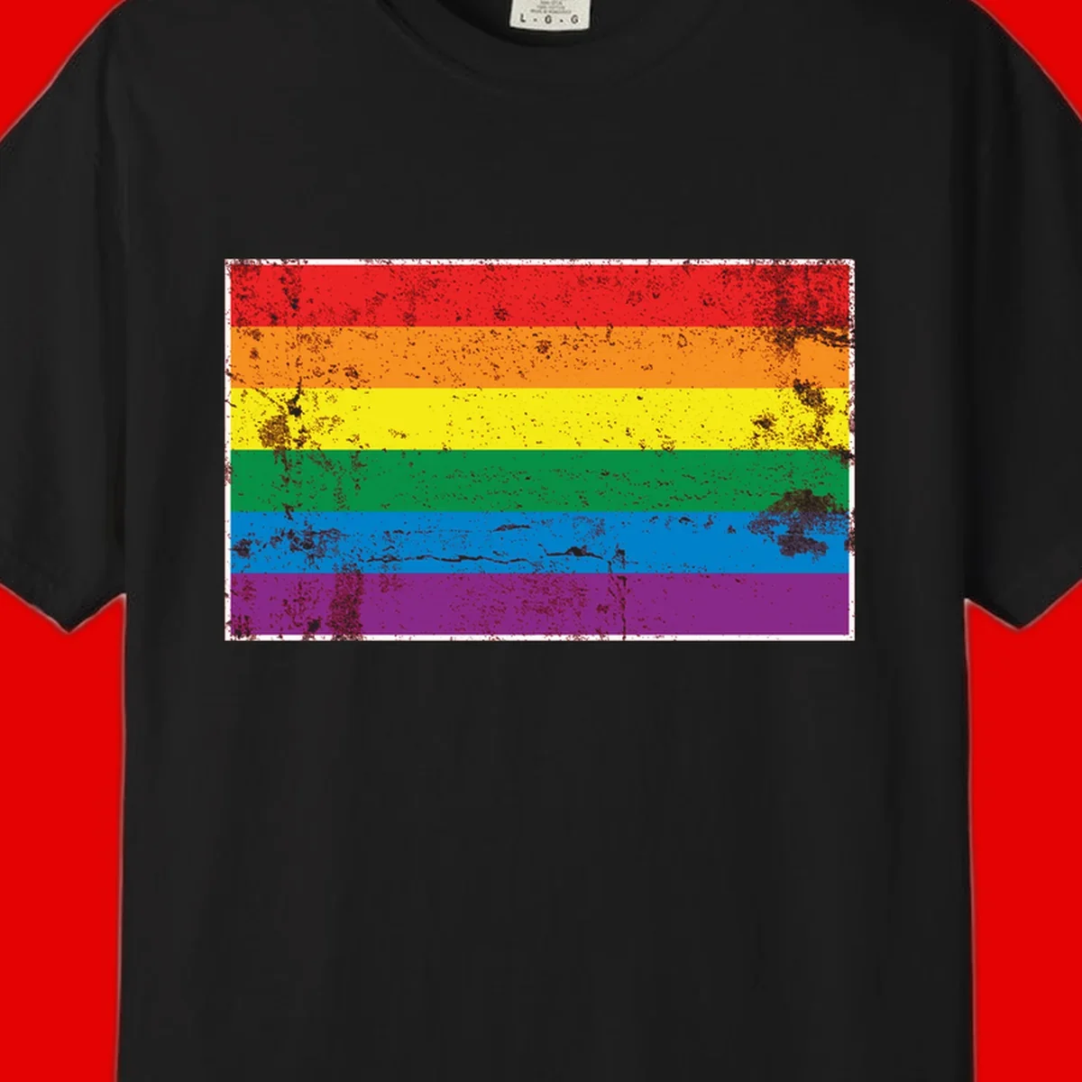 Distressed rainbow pride flag with six horizontal color stripes: red, orange, yellow, green, blue, and purple with grunge texture
