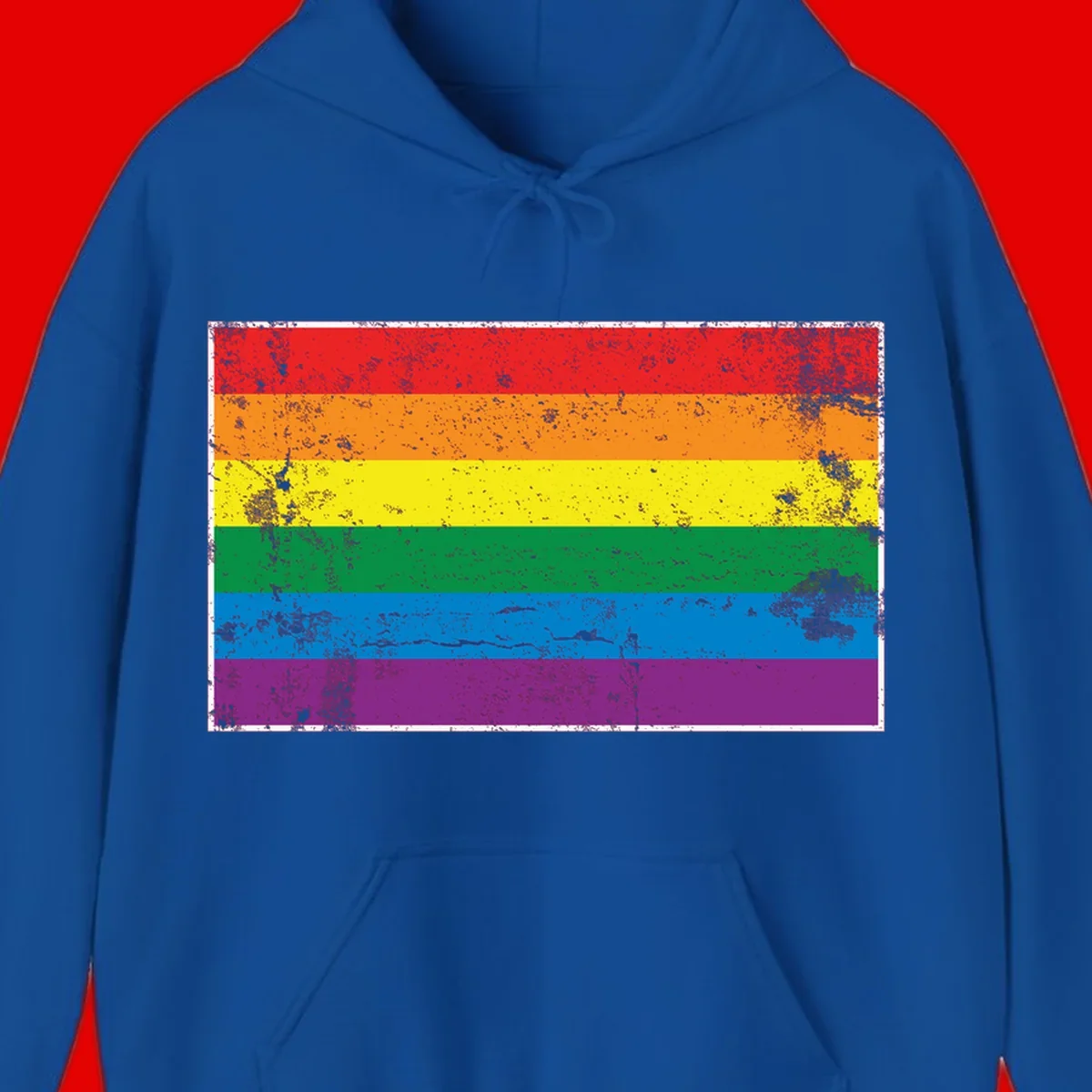 Distressed rainbow pride flag with six horizontal color stripes: red, orange, yellow, green, blue, and purple with grunge texture