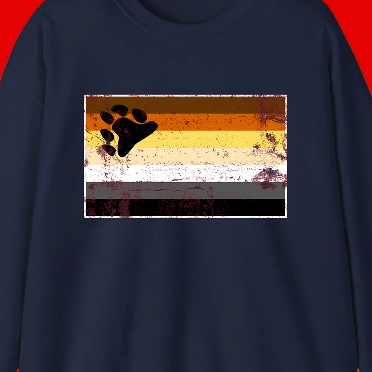 Black bear paw print on distressed horizontal striped pride flag in brown, orange, yellow, tan, white, gray and black colors
