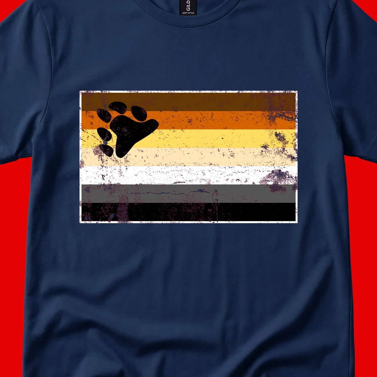 Black bear paw print on distressed horizontal striped pride flag in brown, orange, yellow, tan, white, gray and black colors
