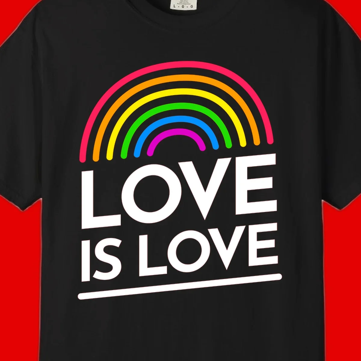 Love is love pride design with colorful rainbow arc and white text on gray background