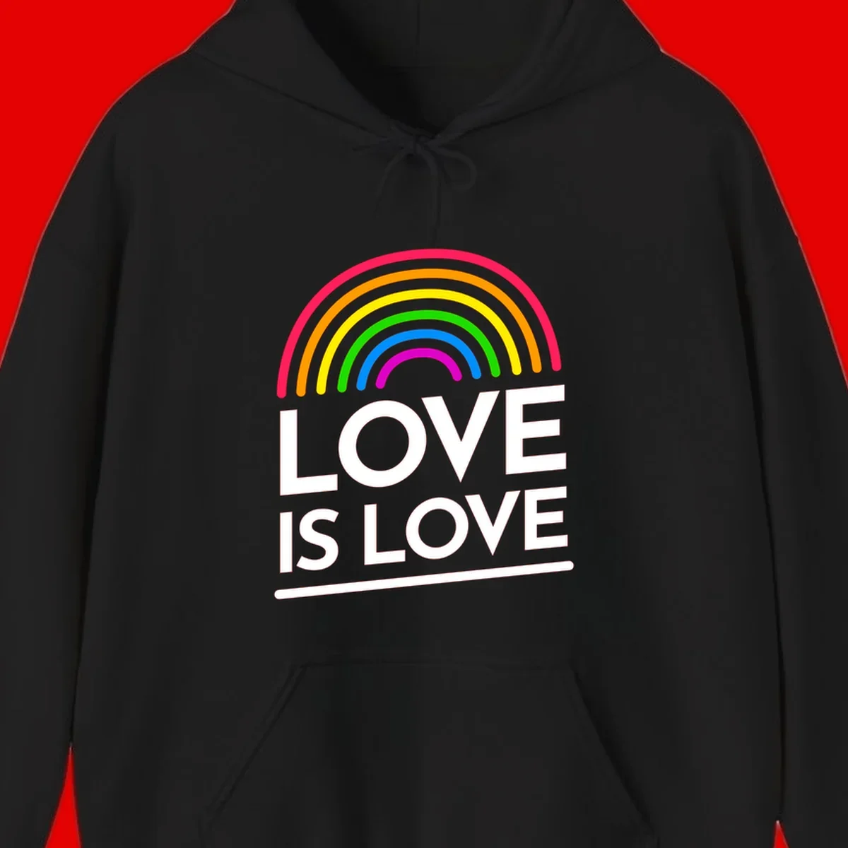 Love is love pride design with colorful rainbow arc and white text on gray background