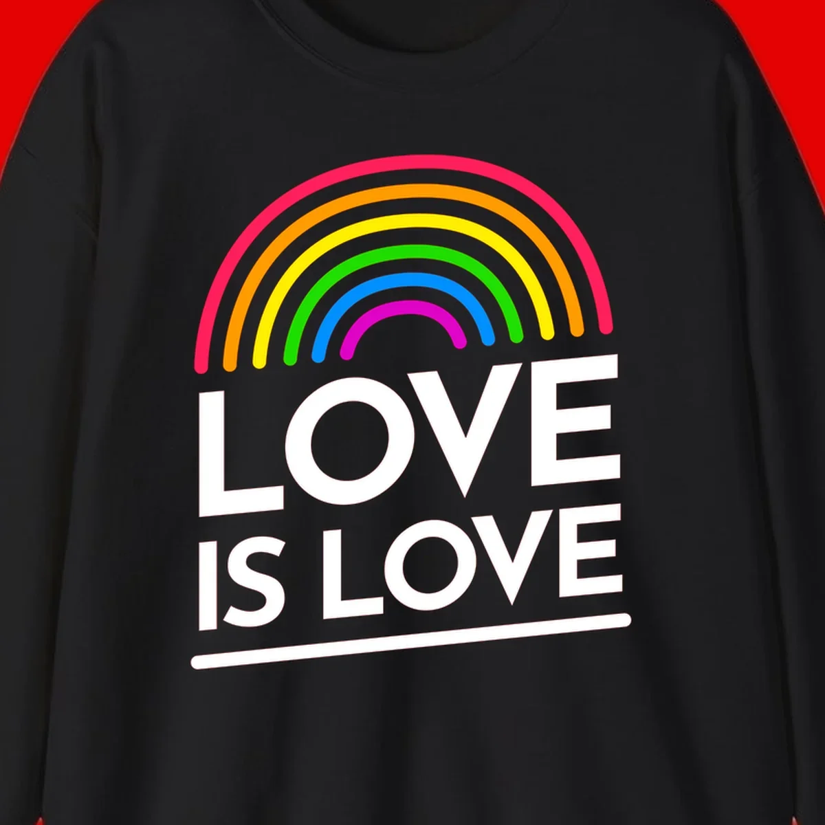 Love is love pride design with colorful rainbow arc and white text on gray background