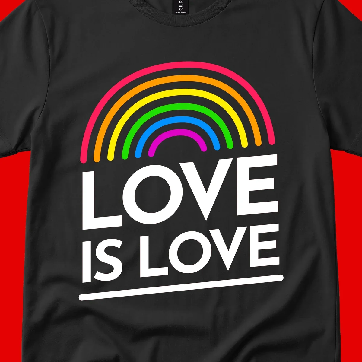 Love is love pride design with colorful rainbow arc and white text on gray background
