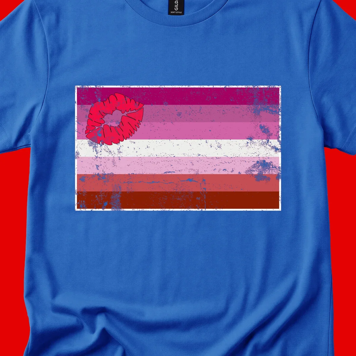 Red lipstick kiss mark overlaying horizontal striped pride flag with distressed grunge texture
