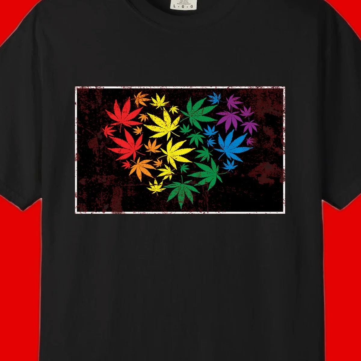 Rainbow cannabis leaves in red, orange, yellow, green, blue, and purple arranged on distressed black background