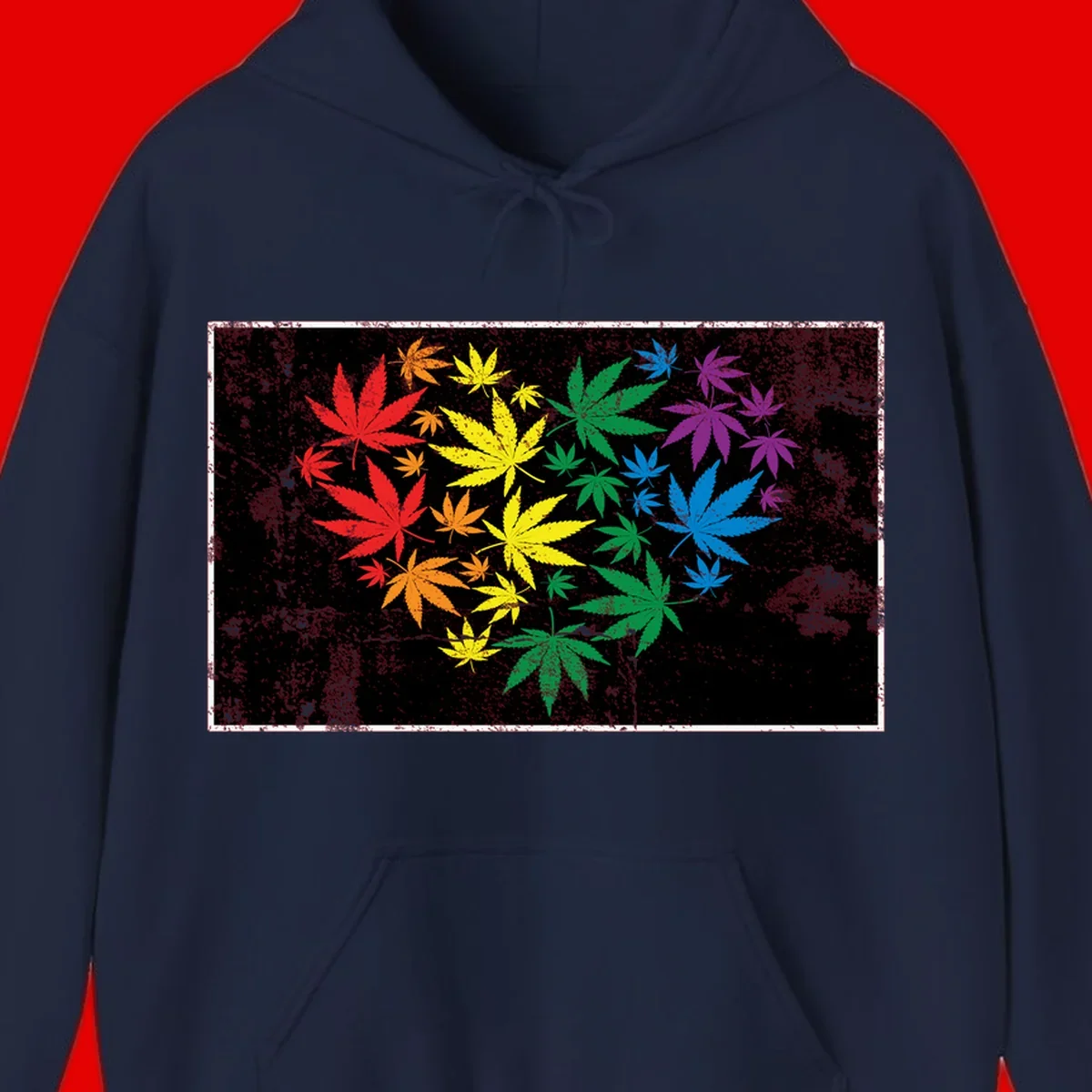 Rainbow cannabis leaves in red, orange, yellow, green, blue, and purple arranged on distressed black background