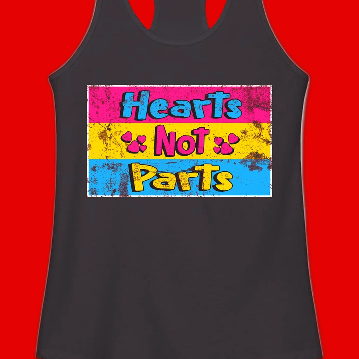 Hearts Not Parts design: magenta, yellow, and blue color-blocked graphic with distressed typography and pink hearts celebrating trans and non-binary identity