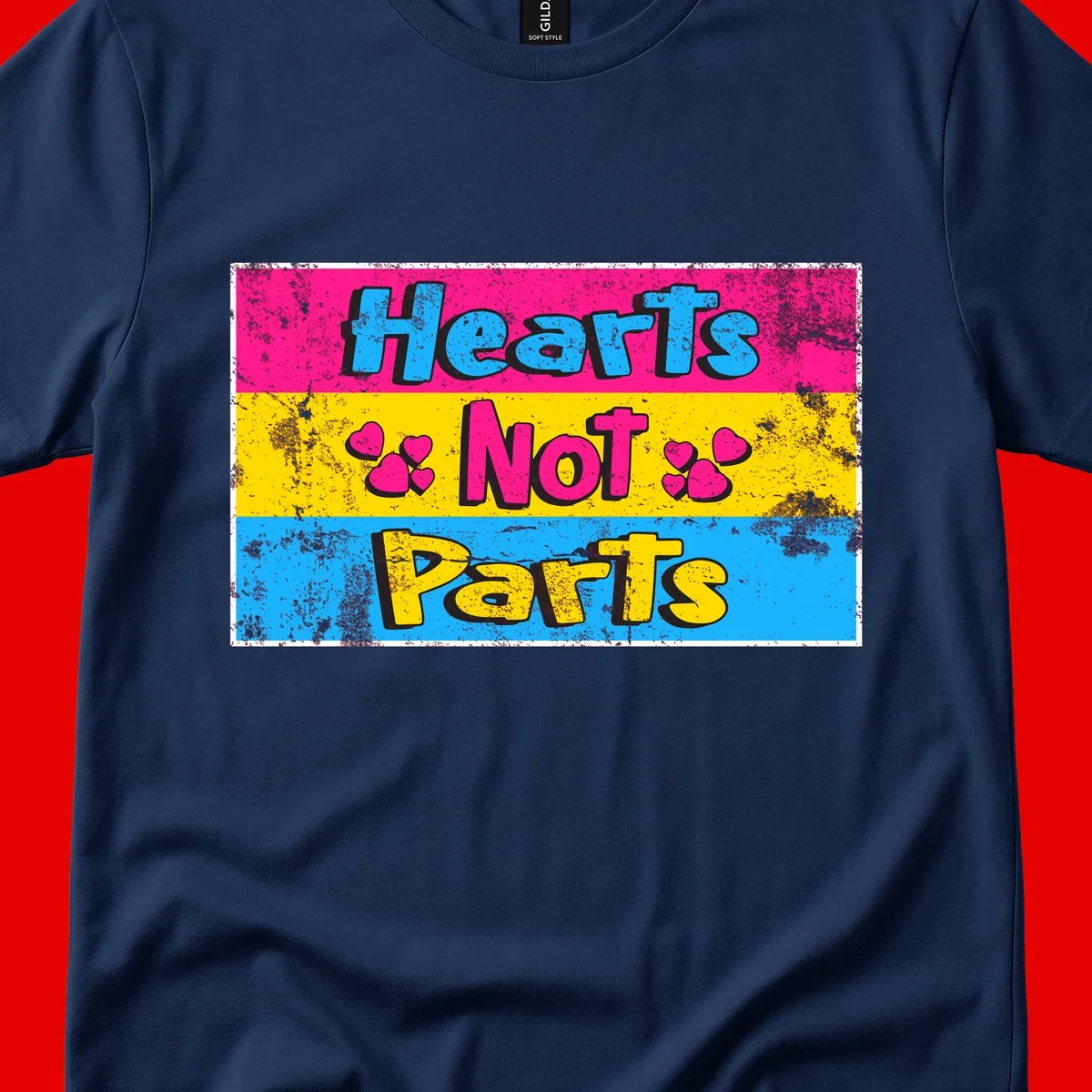Hearts Not Parts design: magenta, yellow, and blue color-blocked graphic with distressed typography and pink hearts celebrating trans and non-binary identity
