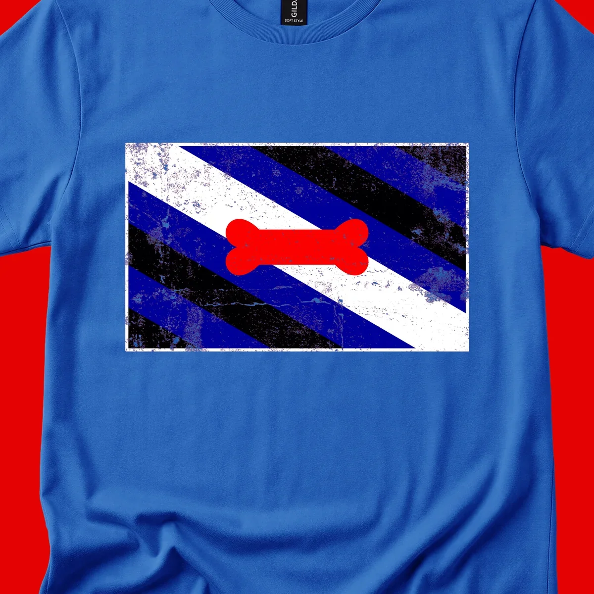 Red bone shape on distressed blue, white, and black diagonal striped background with pride flag colors