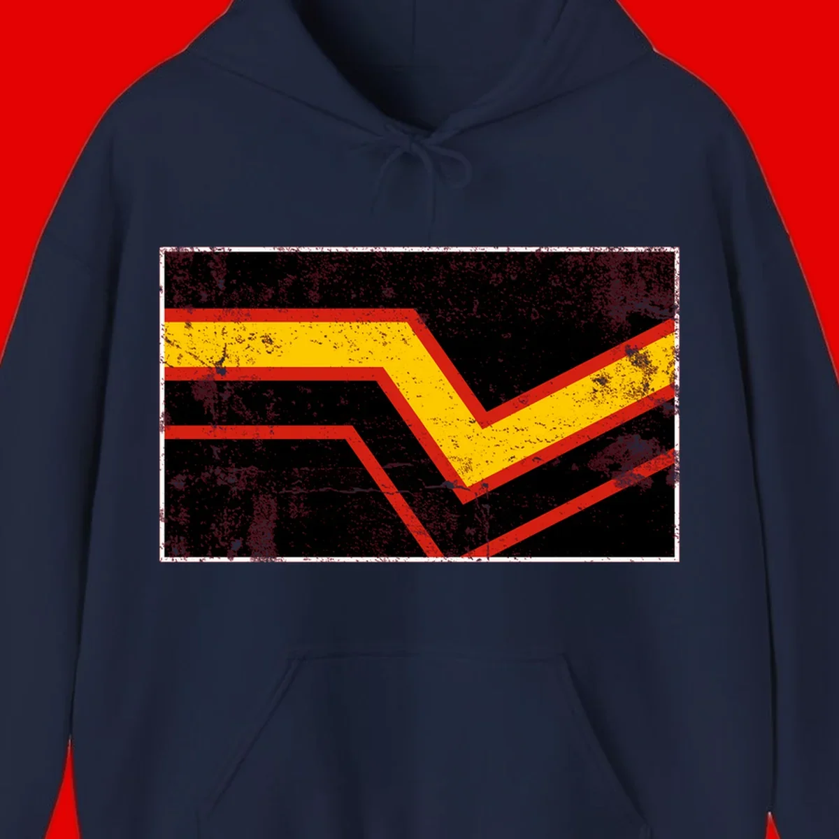 Bold geometric chevron checkmark with red and yellow stripes on distressed black background