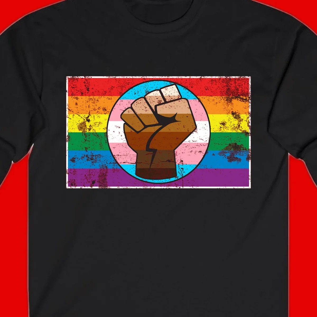 Raised brown fist in circular badge with rainbow pride flag and trans flag stripe background symbolizing LGBTQ+ solidarity