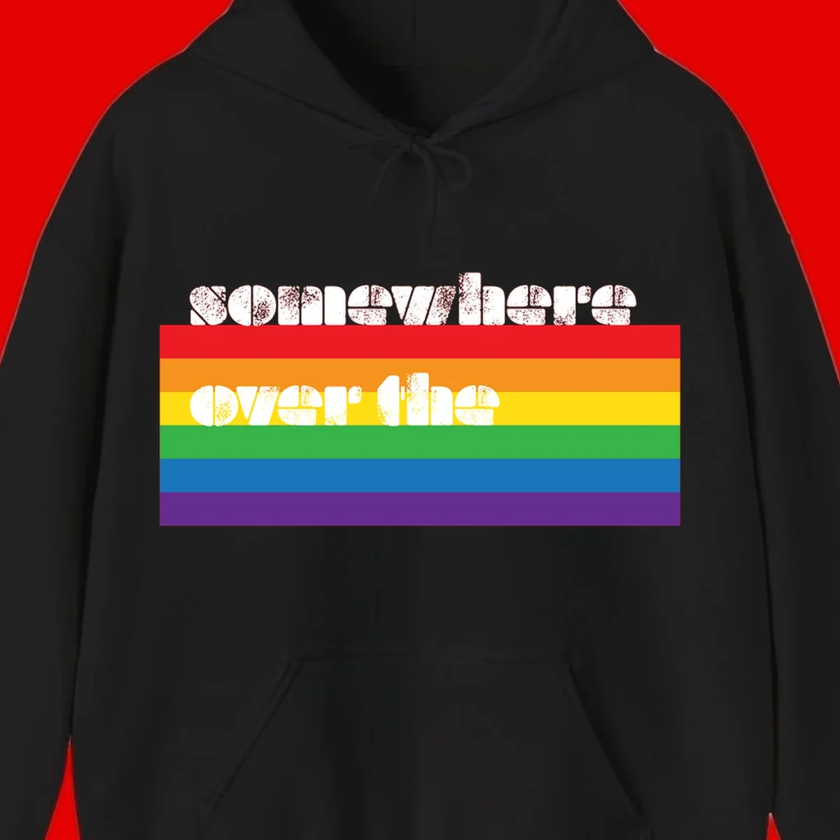 Somewhere over the rainbow pride design with white distressed text over six-color horizontal pride flag stripes