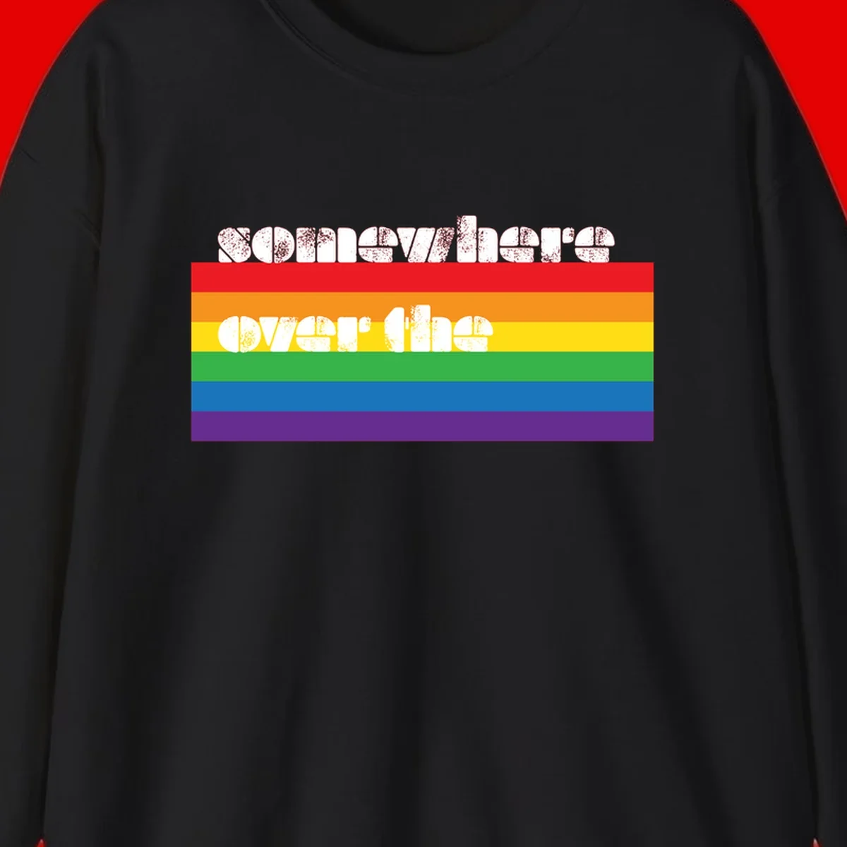 Somewhere over the rainbow pride design with white distressed text over six-color horizontal pride flag stripes
