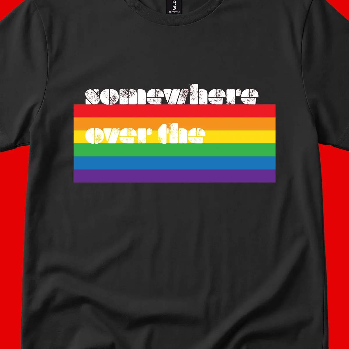 Somewhere over the rainbow pride design with white distressed text over six-color horizontal pride flag stripes