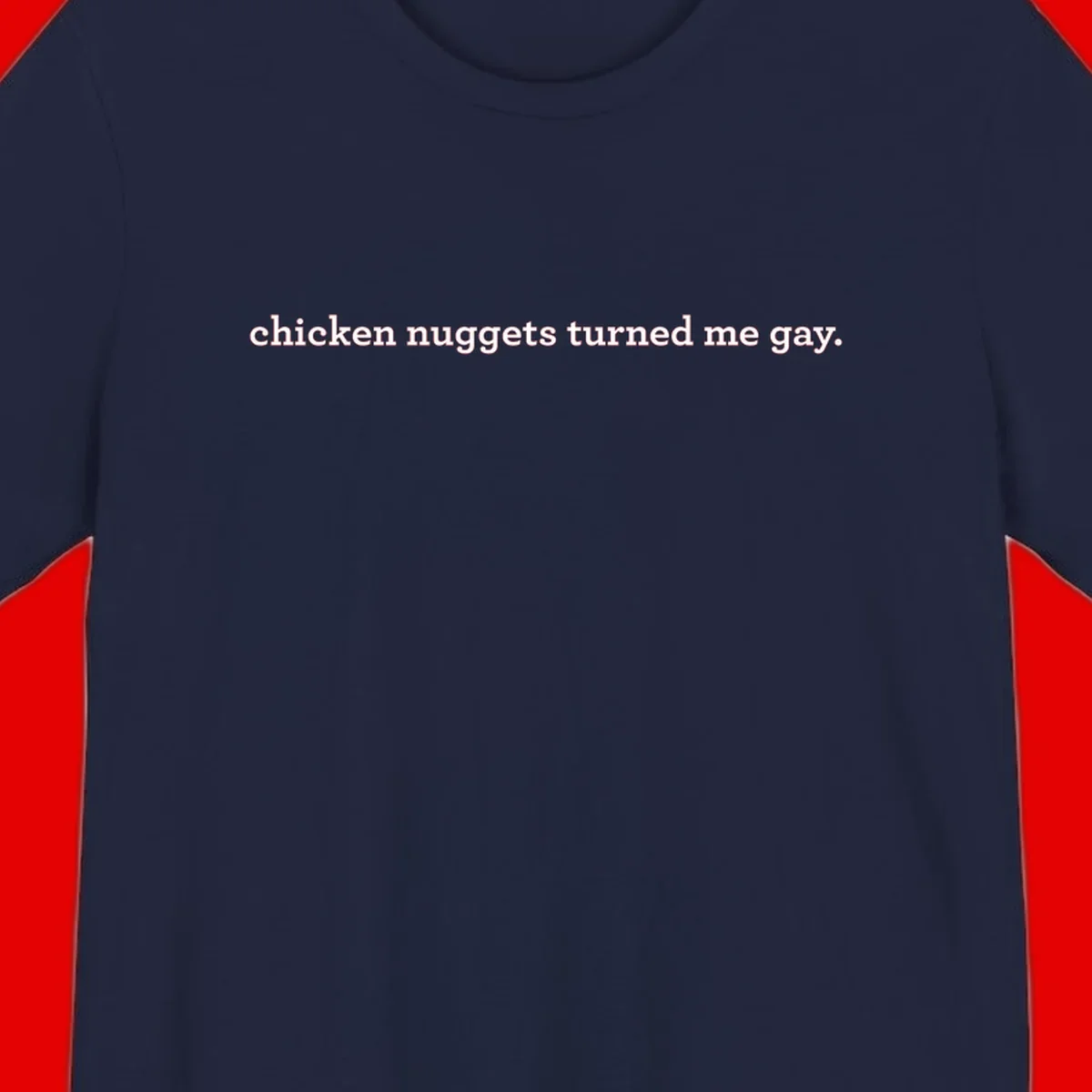 White text reading 'chicken nuggets turned me gay' on gray background - humorous pride design