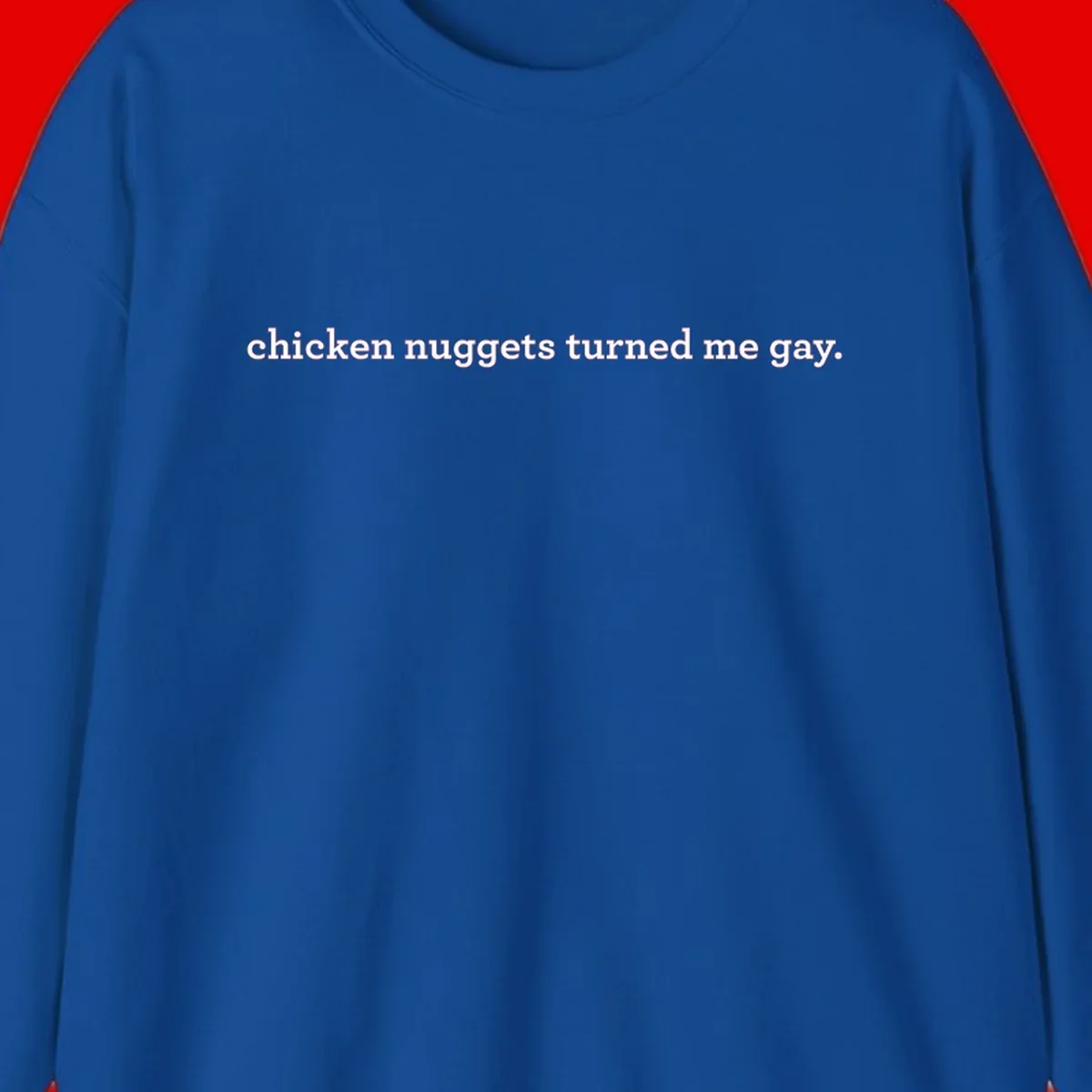 White text reading 'chicken nuggets turned me gay' on gray background - humorous pride design