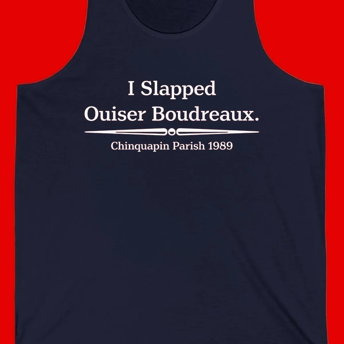 White text on gray background reading 'I Slapped Ouiser Boudreaux. Chinquapin Parish 1989' with decorative line divider