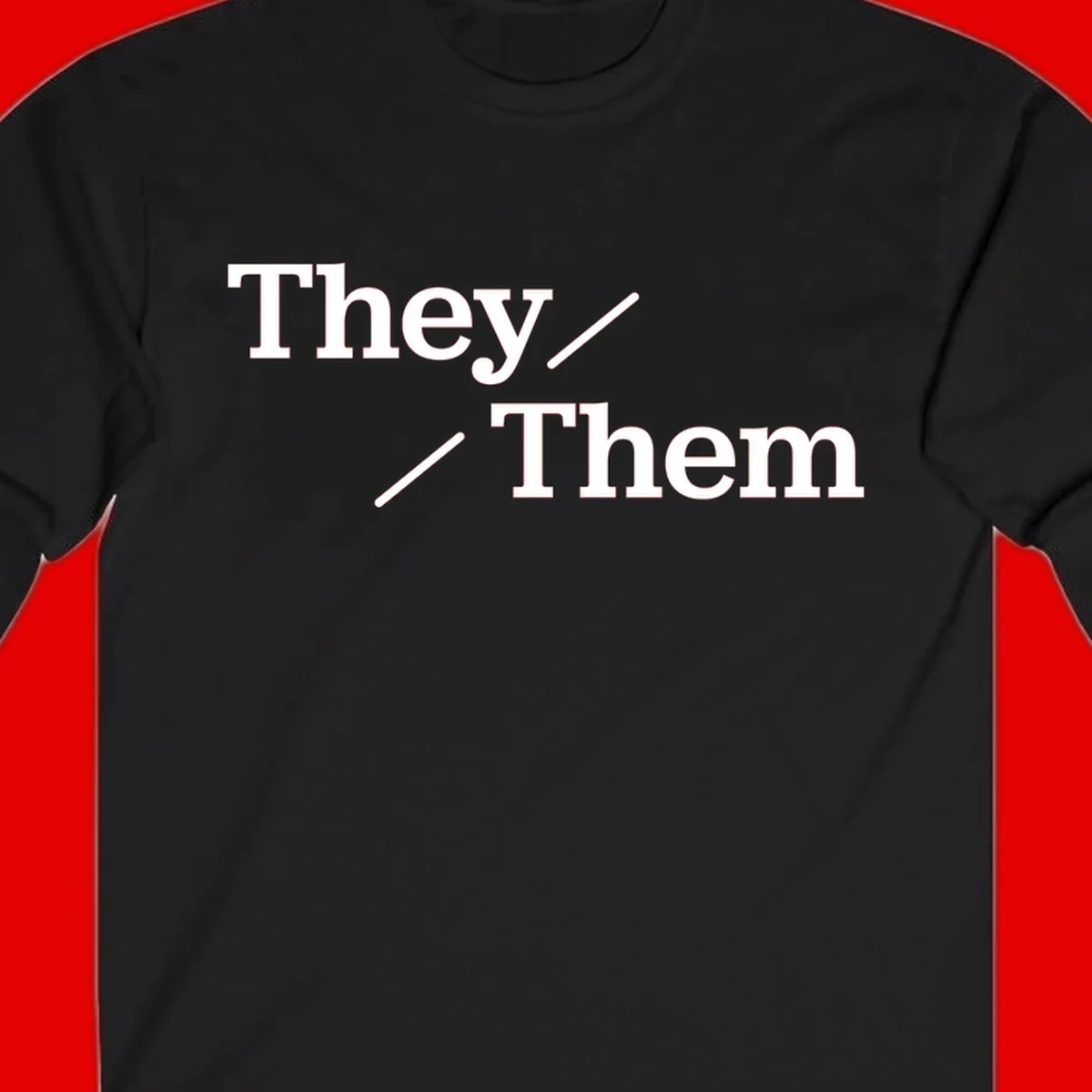 Minimalist design with white text reading 'They / Them' on gray background, celebrating gender-inclusive pronouns