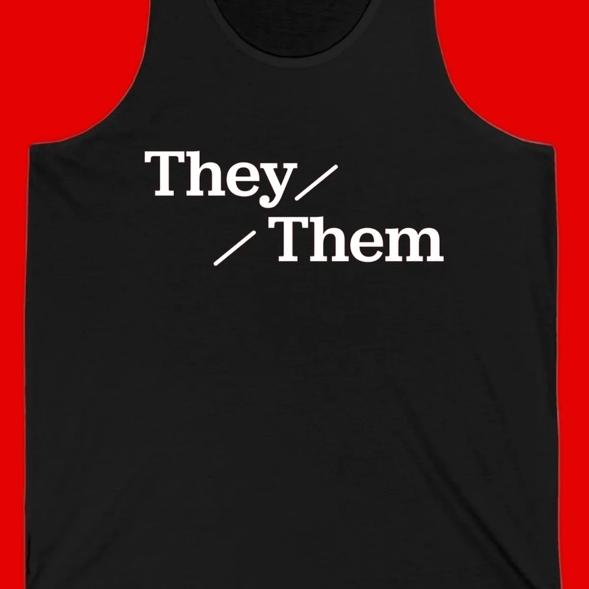 Minimalist design with white text reading 'They / Them' on gray background, celebrating gender-inclusive pronouns