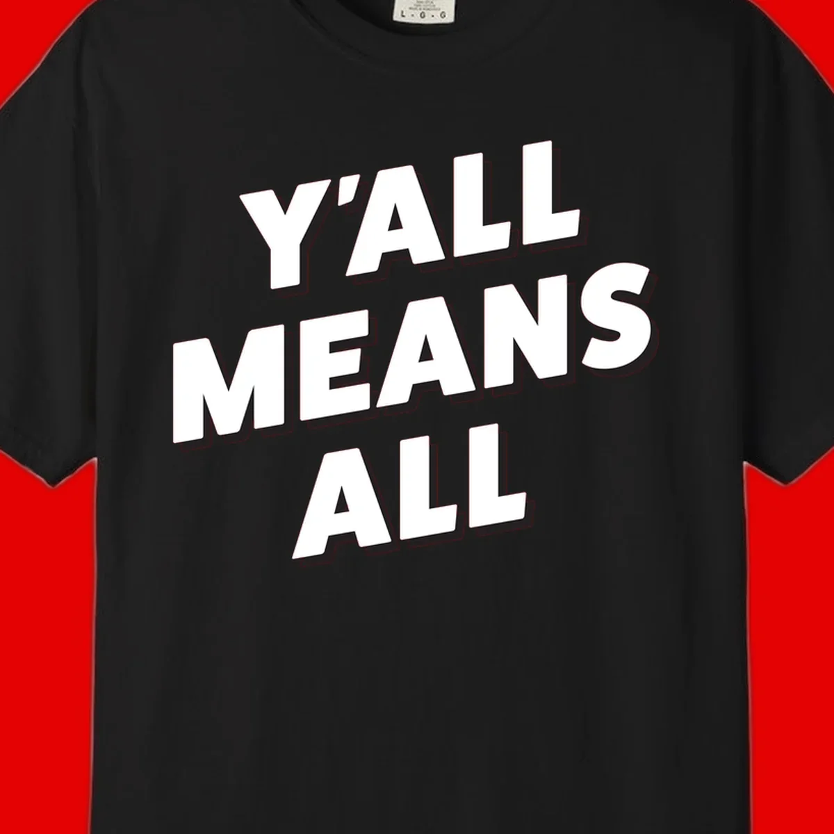 Bold 3D typography design reading 'Y'ALL MEANS ALL' in white letters with black shadow effect, promoting inclusivity and belonging