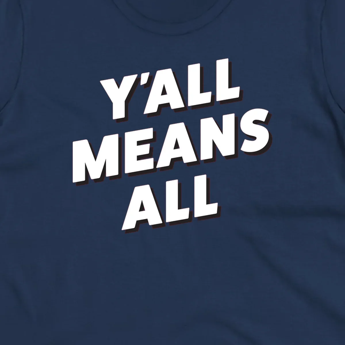 Bold 3D typography design reading 'Y'ALL MEANS ALL' in white letters with black shadow effect, promoting inclusivity and belonging