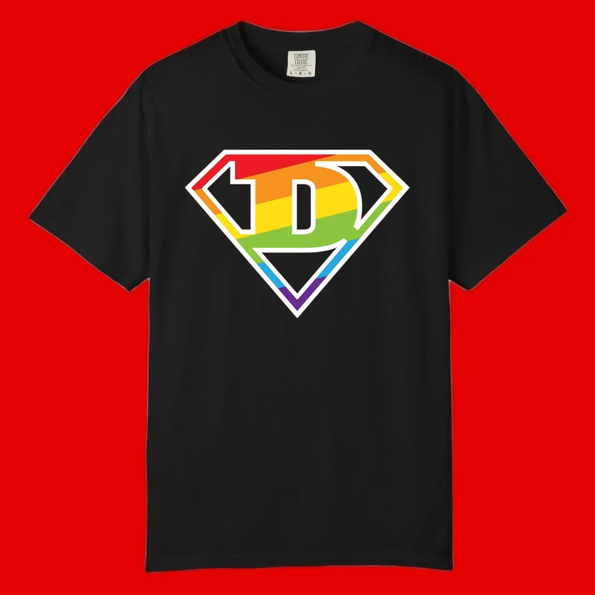 Rainbow pride shield with letter D centered, featuring red, orange, yellow, green, blue, and purple horizontal stripes with white chevron borders