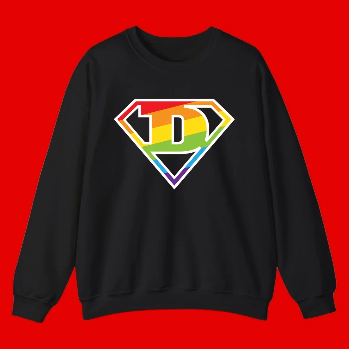 Rainbow pride shield with letter D centered, featuring red, orange, yellow, green, blue, and purple horizontal stripes with white chevron borders