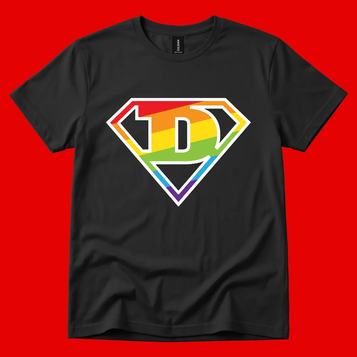 Rainbow pride shield with letter D centered, featuring red, orange, yellow, green, blue, and purple horizontal stripes with white chevron borders