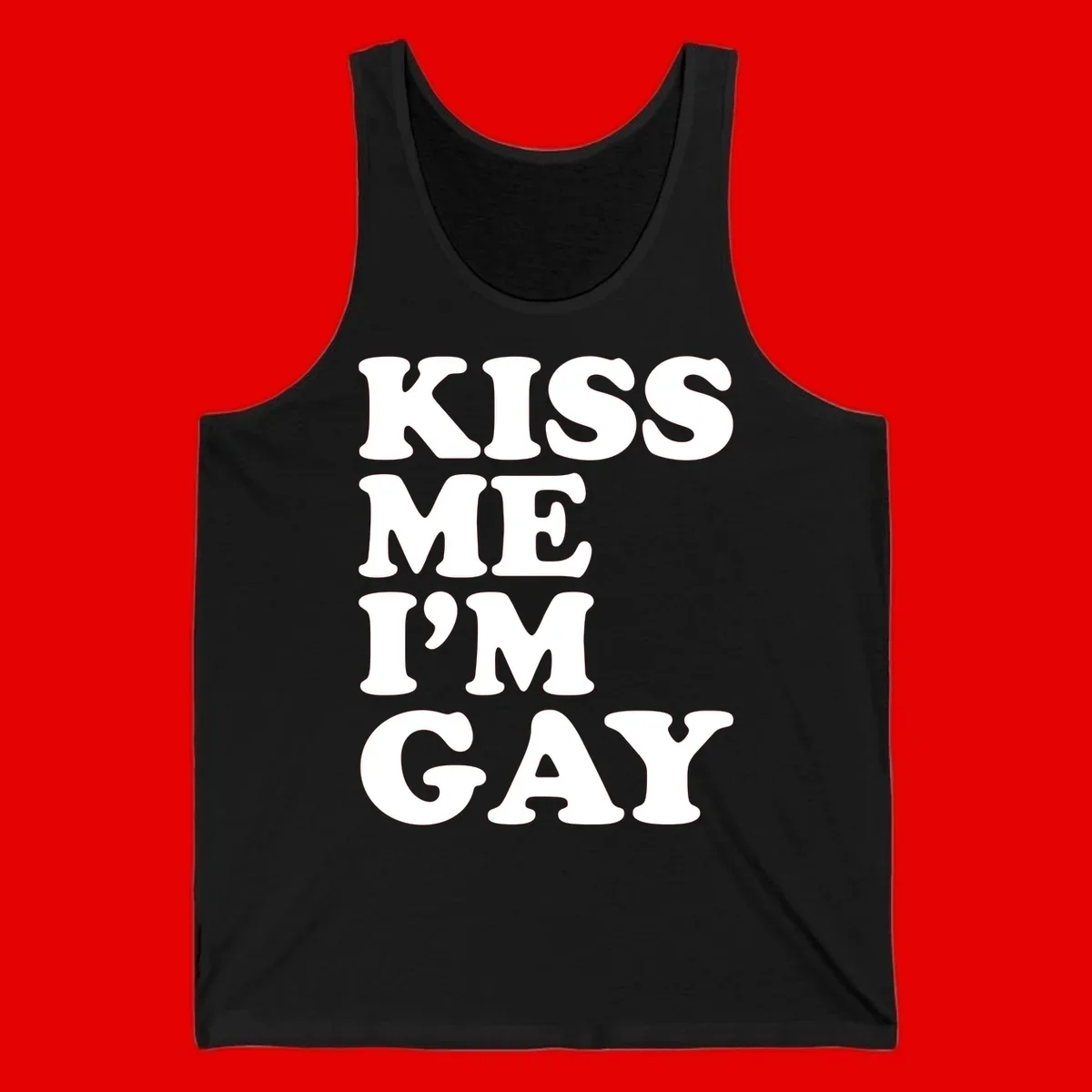 Bold white block letters spelling 'KISS ME I'M GAY' stacked vertically on gray background