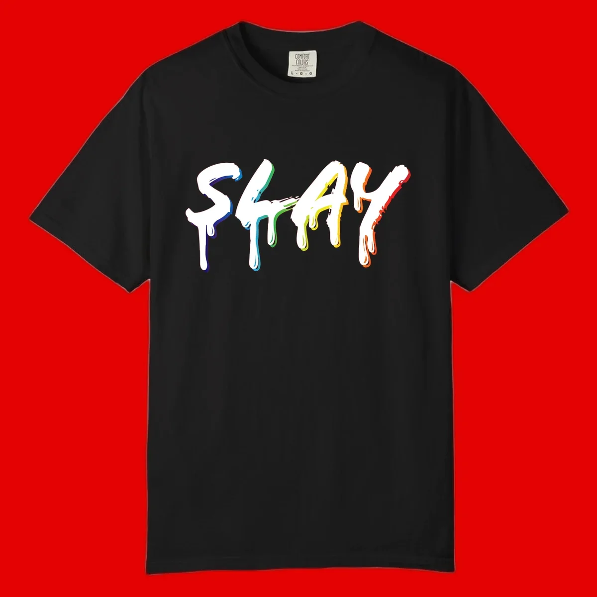 The word STAY in white letters with rainbow pride-colored paint drips flowing downward, featuring blue, teal, green, yellow, orange, and red colors on gray background