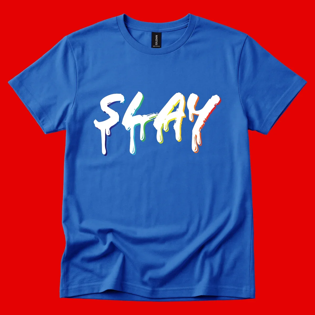 The word STAY in white letters with rainbow pride-colored paint drips flowing downward, featuring blue, teal, green, yellow, orange, and red colors on gray background