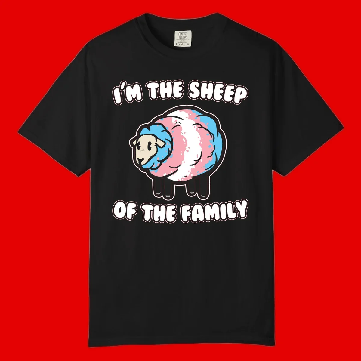 Cartoon sheep with blue and pink wool and text reading 'I'm The Sheep Of The Family'