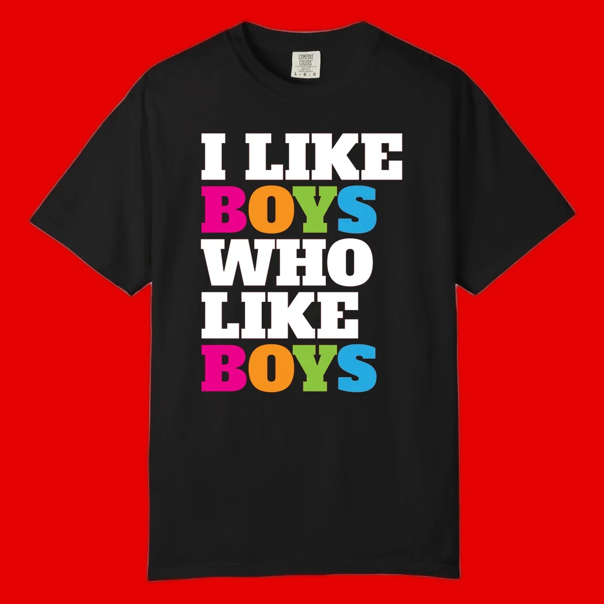 Colorful text design reading 'I Like Boys Who Like Boys' in magenta, orange, lime green, and cyan letters on gray background