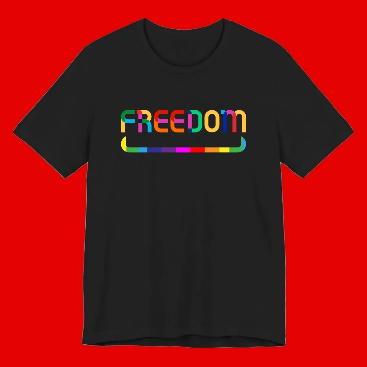 Colorful FREEDOM text in rainbow letters with geometric shapes and pride flag color bar below on gray background