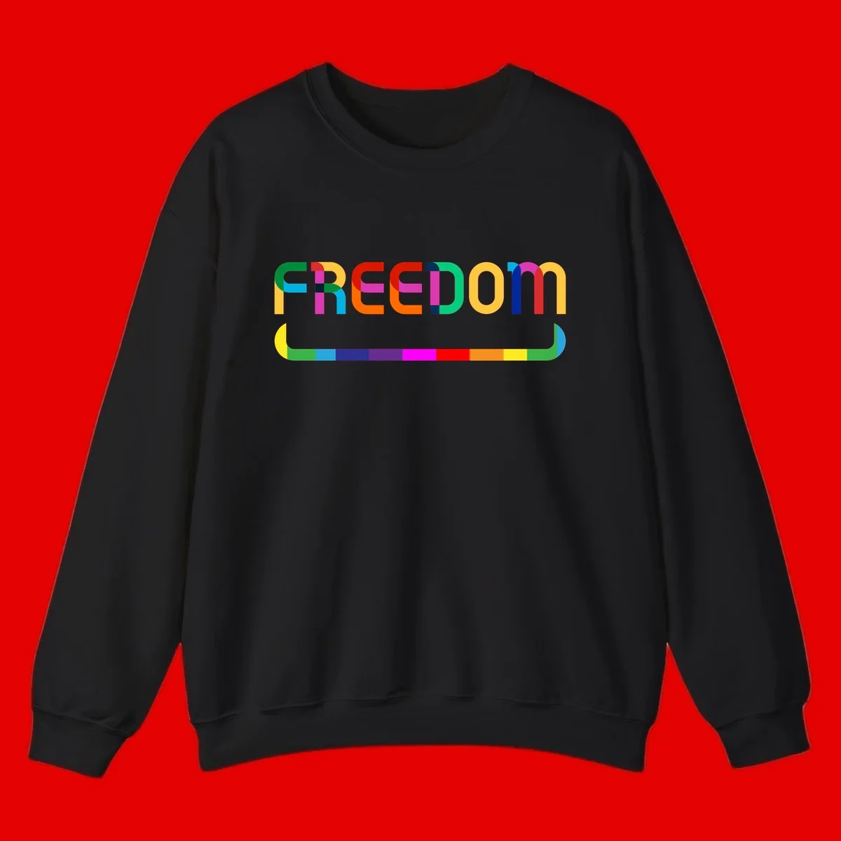 Colorful FREEDOM text in rainbow letters with geometric shapes and pride flag color bar below on gray background