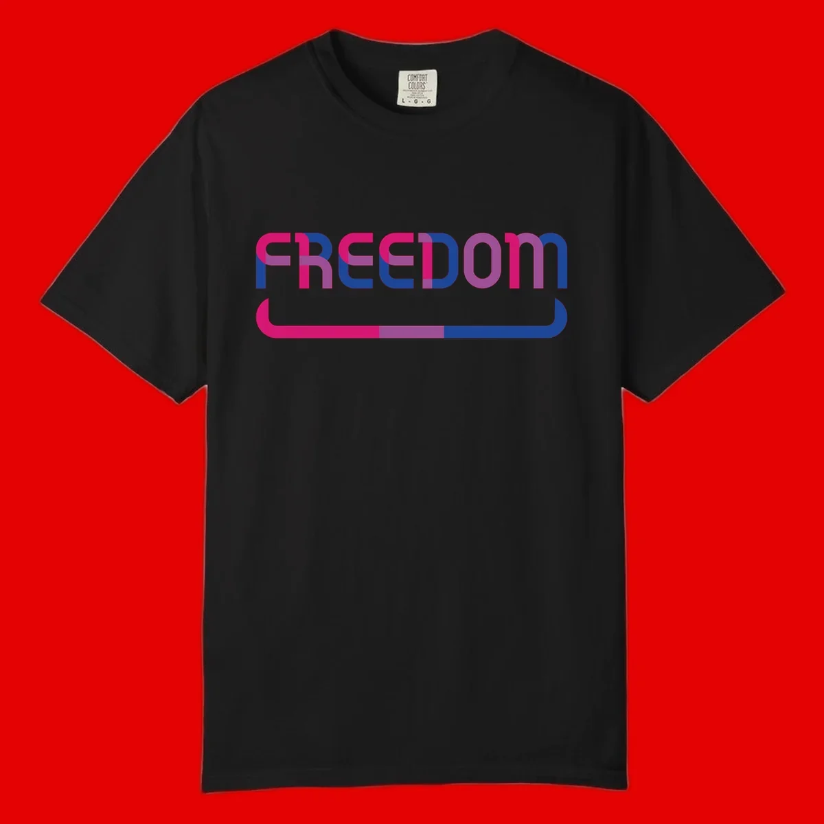 Freedom On Pride design: Bold magenta and purple 'FREEDOM' text with curved gradient underline transitioning from pink through purple to blue