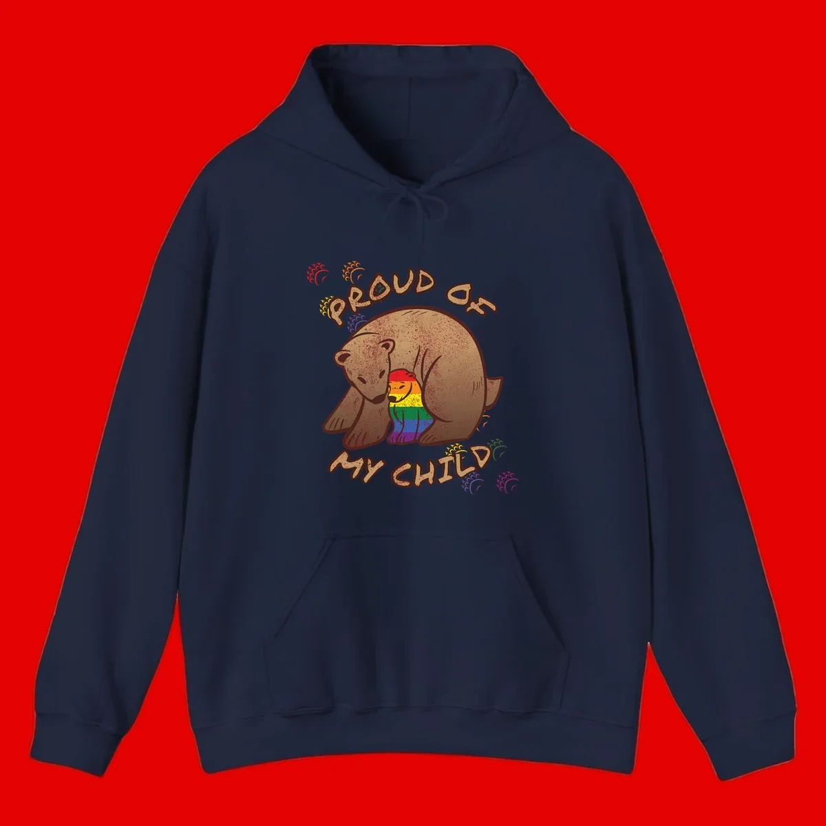 Brown bear proudly displaying rainbow pride colors with 'Proud As Shit' text and decorative bursts