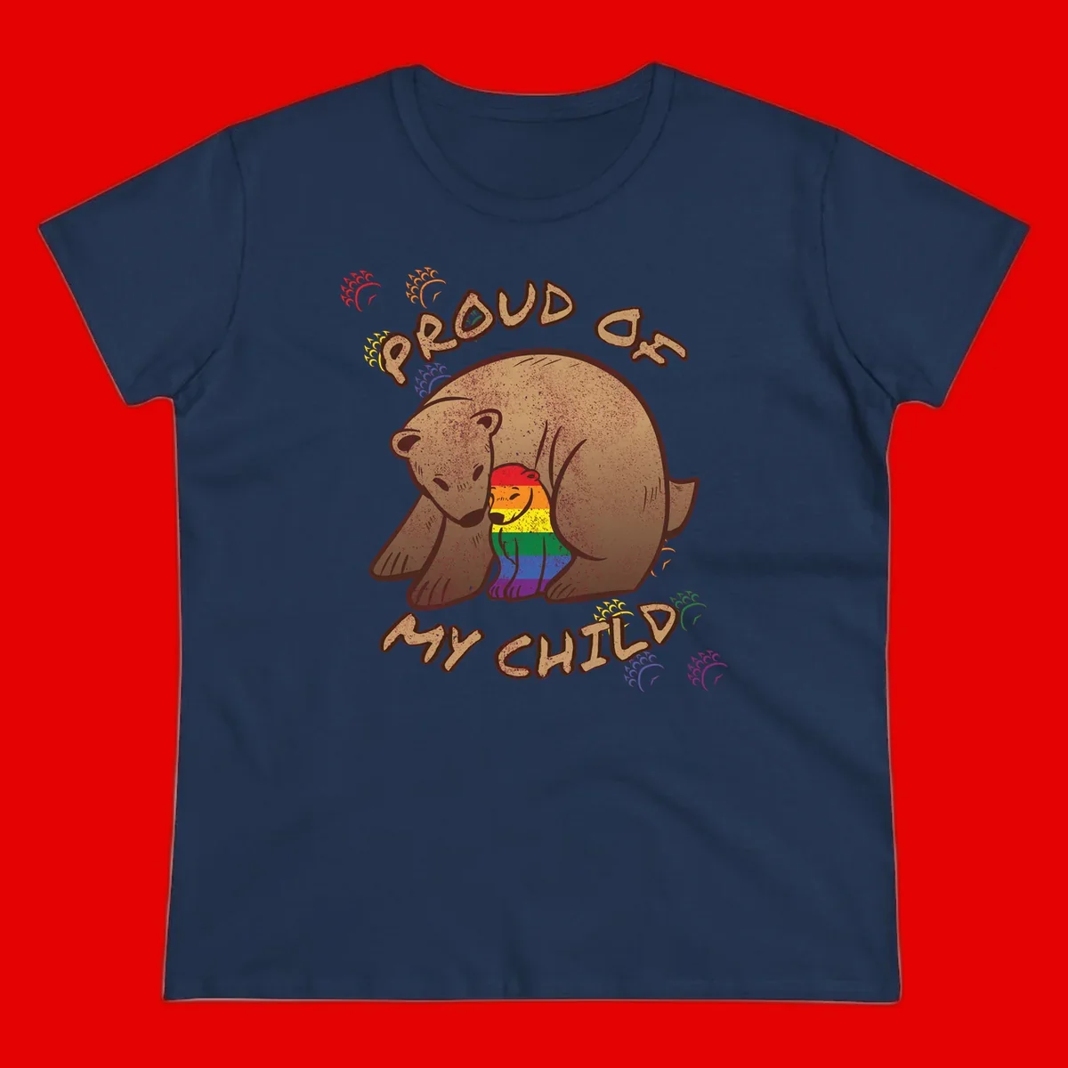 Brown bear proudly displaying rainbow pride colors with 'Proud As Shit' text and decorative bursts