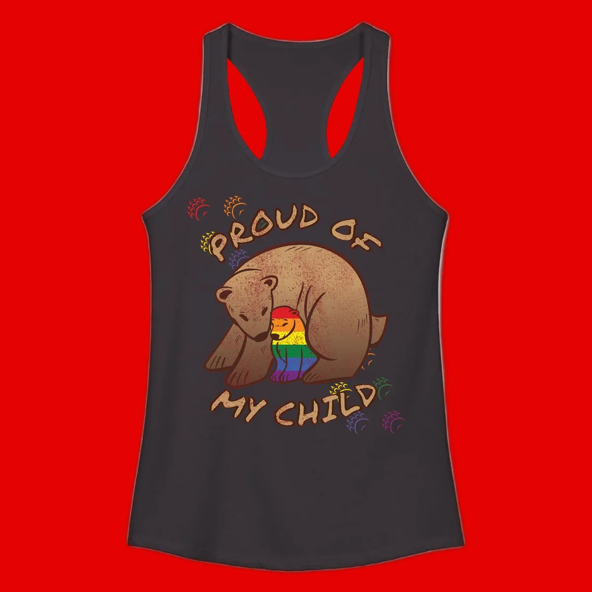Brown bear proudly displaying rainbow pride colors with 'Proud As Shit' text and decorative bursts