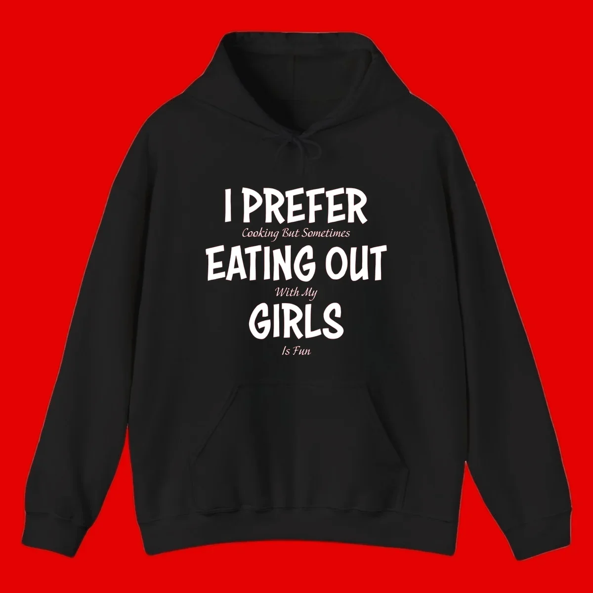 Humorous text design reading 'I Prefer Cooking But Sometimes Eating Out With My Girls Is Fun' in white bold letters on gray background