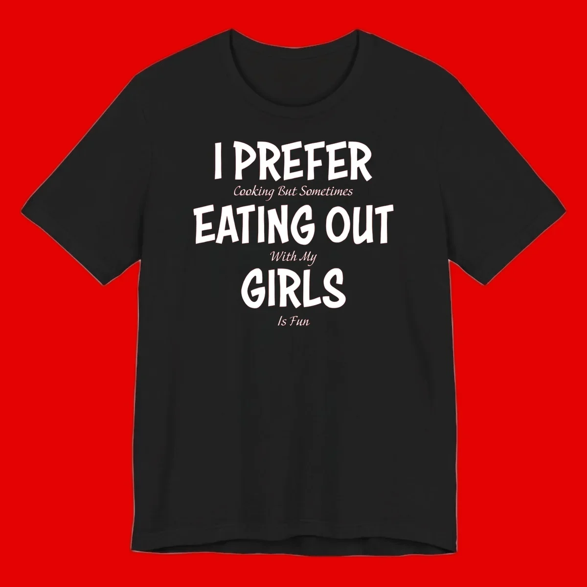 Humorous text design reading 'I Prefer Cooking But Sometimes Eating Out With My Girls Is Fun' in white bold letters on gray background