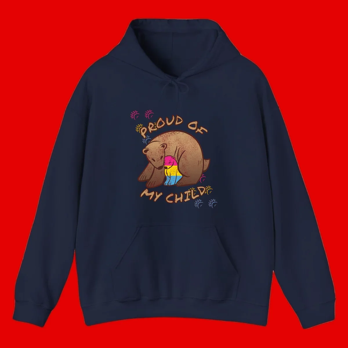 Large bear proudly hugging a smaller bear cub wearing a pride flag shirt, with text reading 'Proud As My Child'