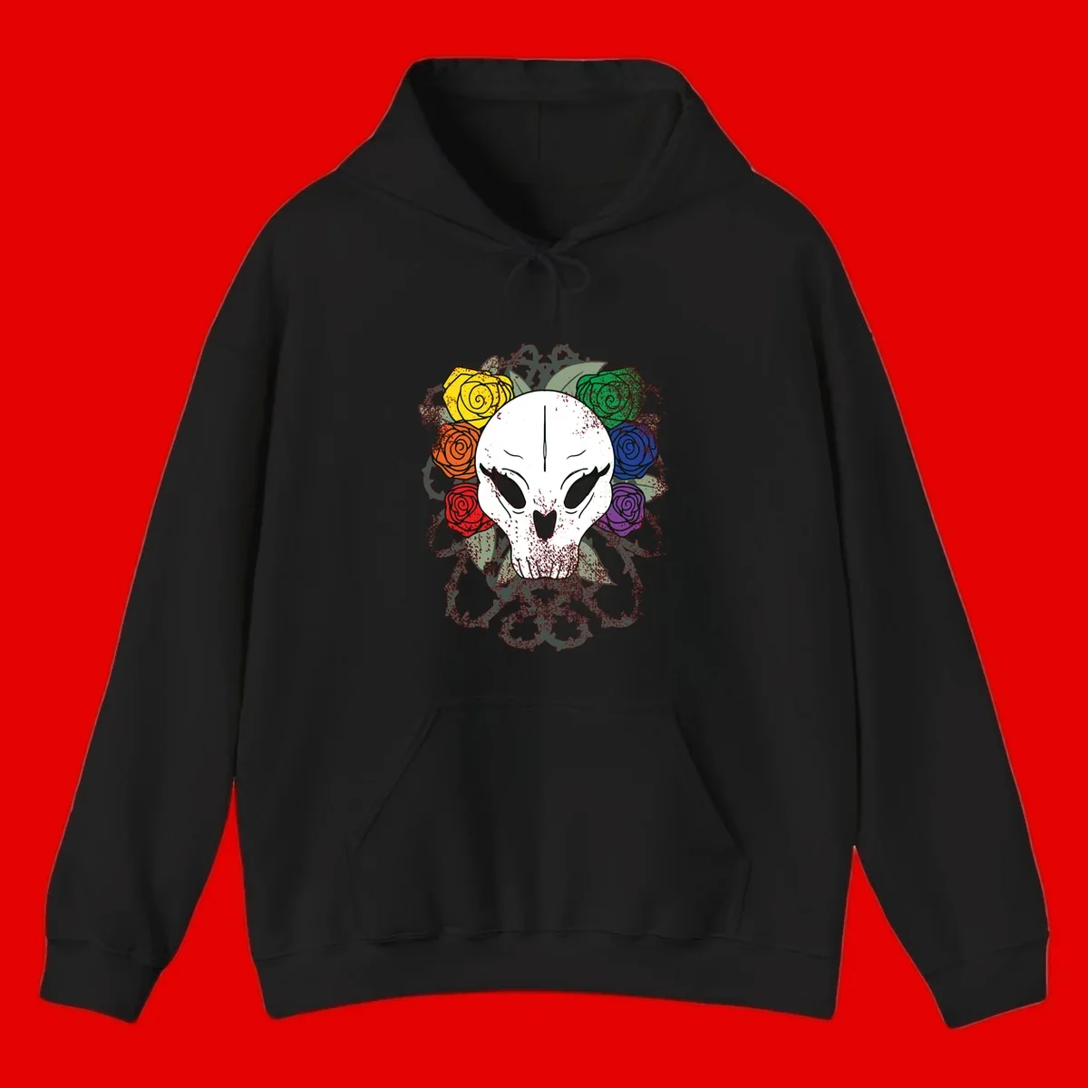 White skull with rainbow colored roses in yellow, orange, red, blue, green, and purple surrounding it on gray background