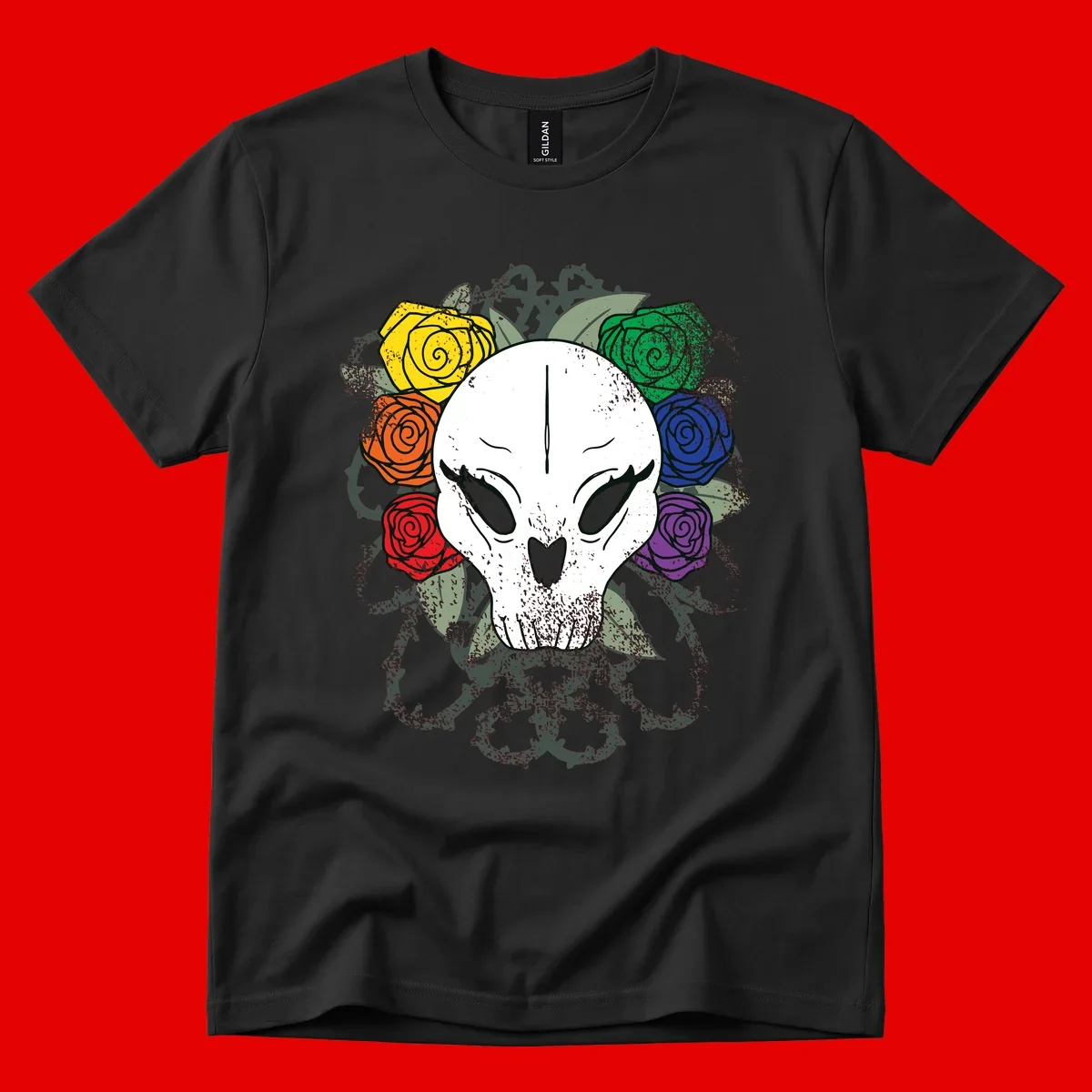 White skull with rainbow colored roses in yellow, orange, red, blue, green, and purple surrounding it on gray background