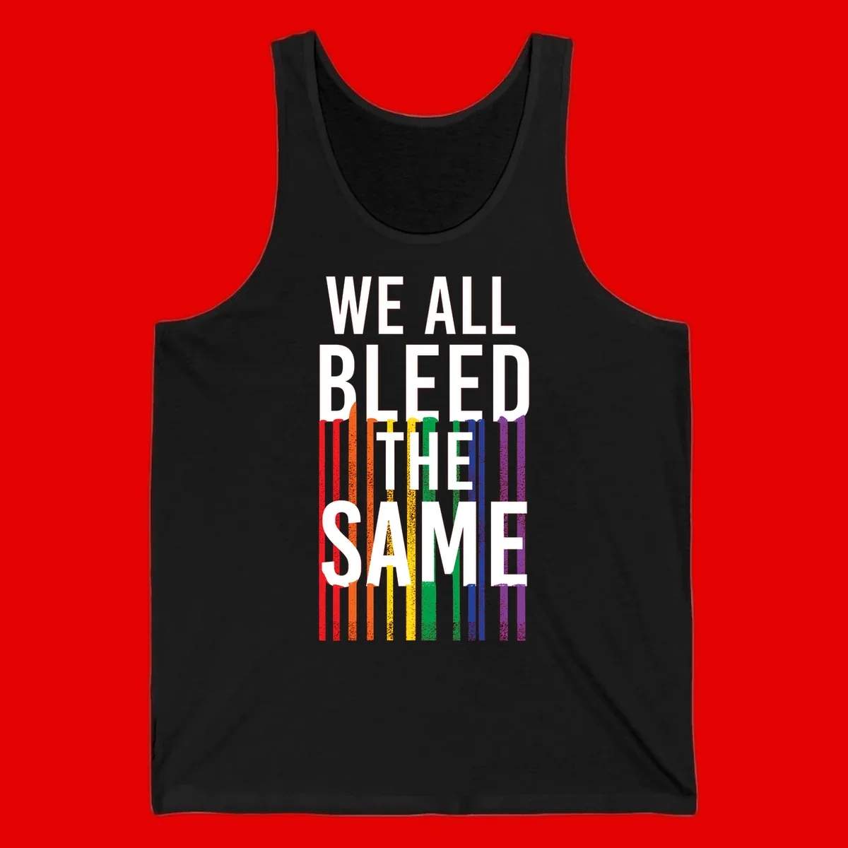 White bold text 'We All Bleed The Same' over rainbow vertical stripes in pride flag colors on gray background