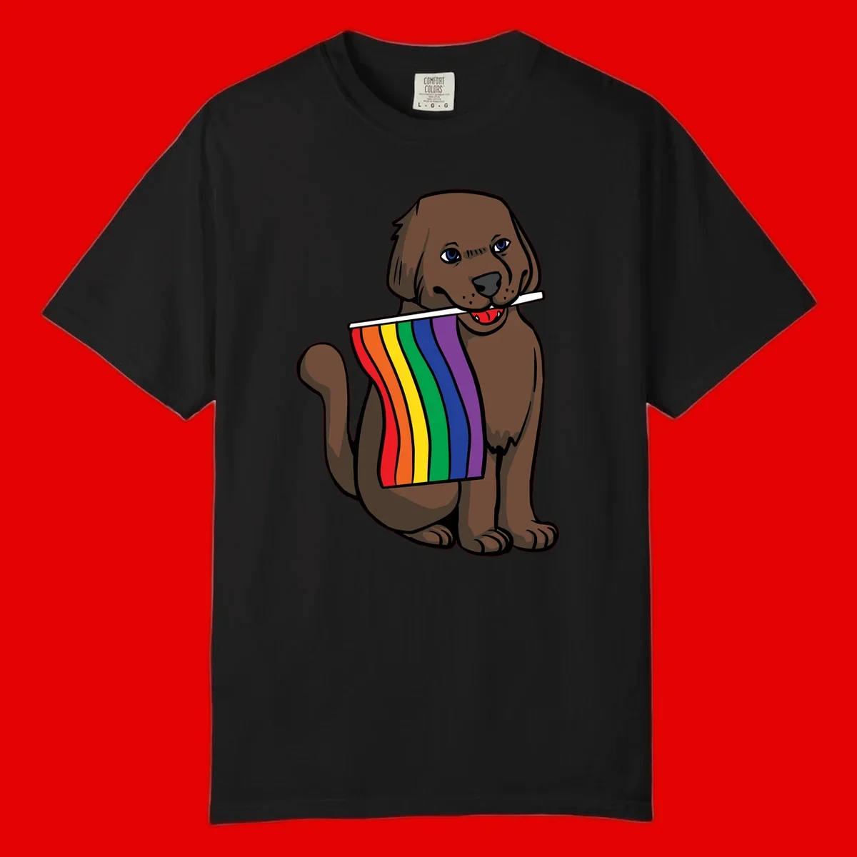 Brown dog holding rainbow pride flag with happy expression and blue eyes