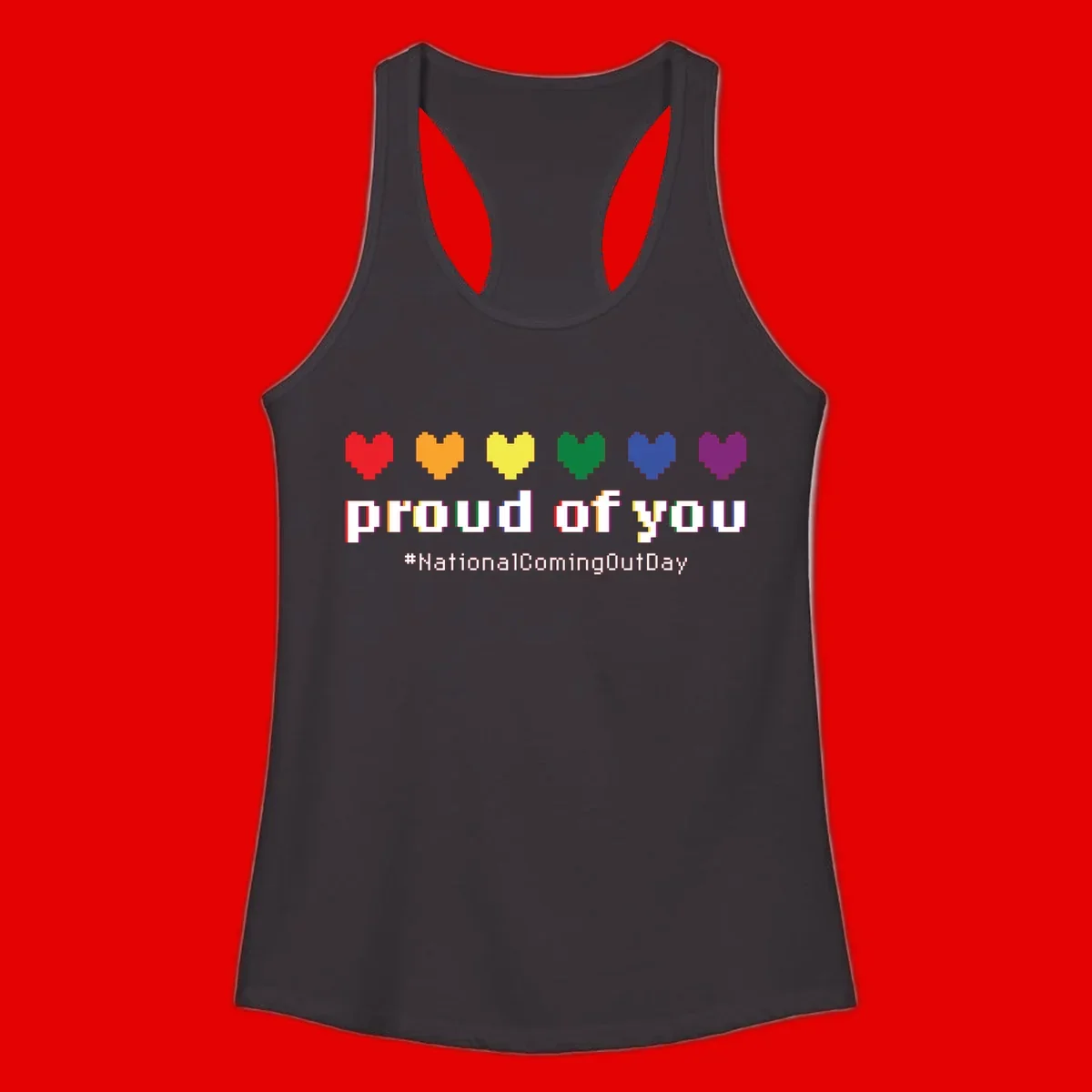 Pixel-art design with six rainbow hearts and text reading 'proud of you #NationalComingOutDay' celebrating coming out visibility
