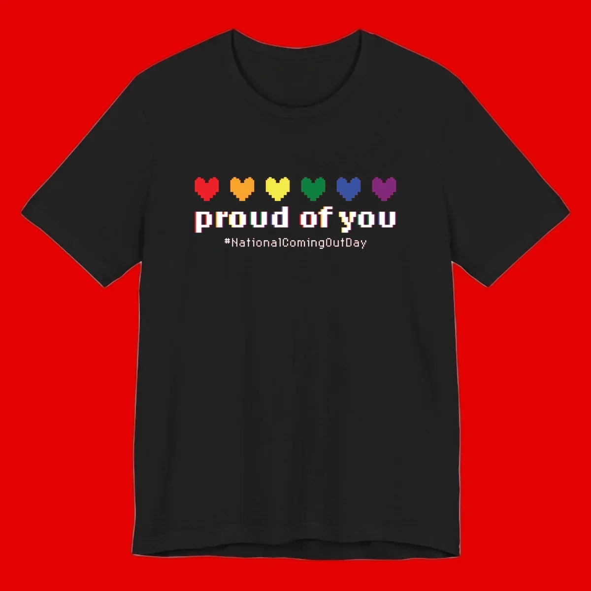 Pixel-art design with six rainbow hearts and text reading 'proud of you #NationalComingOutDay' celebrating coming out visibility